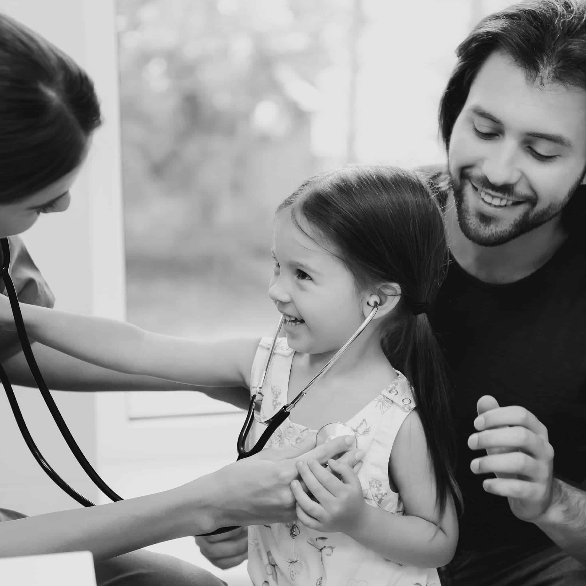 Cardiologists Doctor Plays Auscultation with Kid.